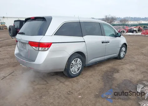 2014 Honda Odyssey Lx z USA, uszkodzony, nr VIN 5FNRL5H26EB058589